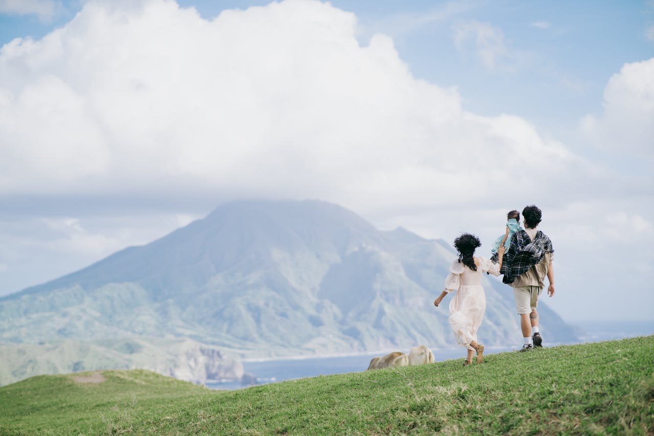 about-01 A family enjoys a day outdoors in the lush landscape of Cagayan Valley, Philippines.